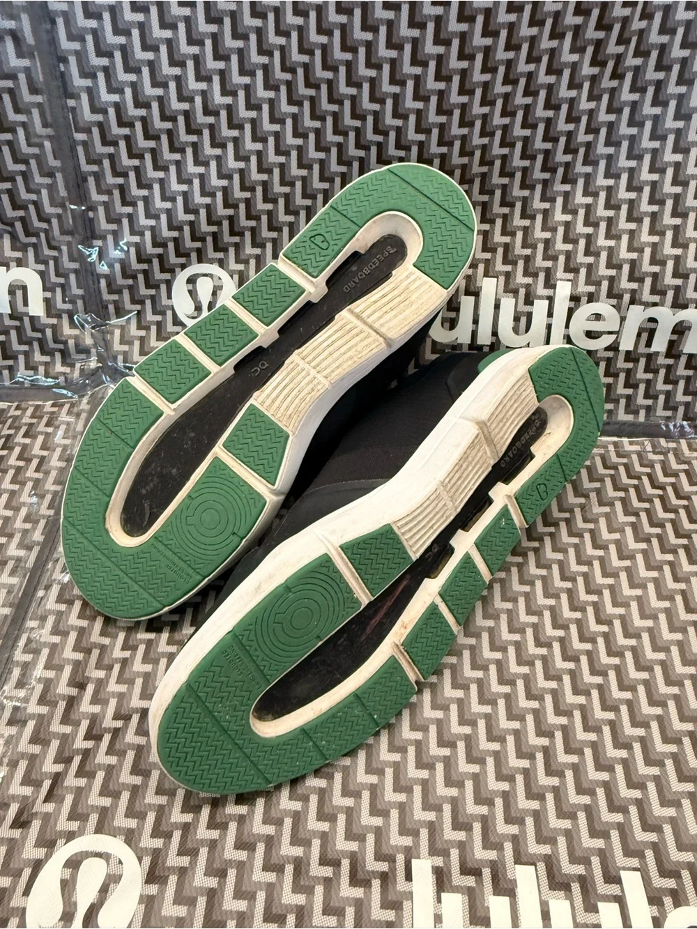 On Running Men's Black Sneakers with Green Accents